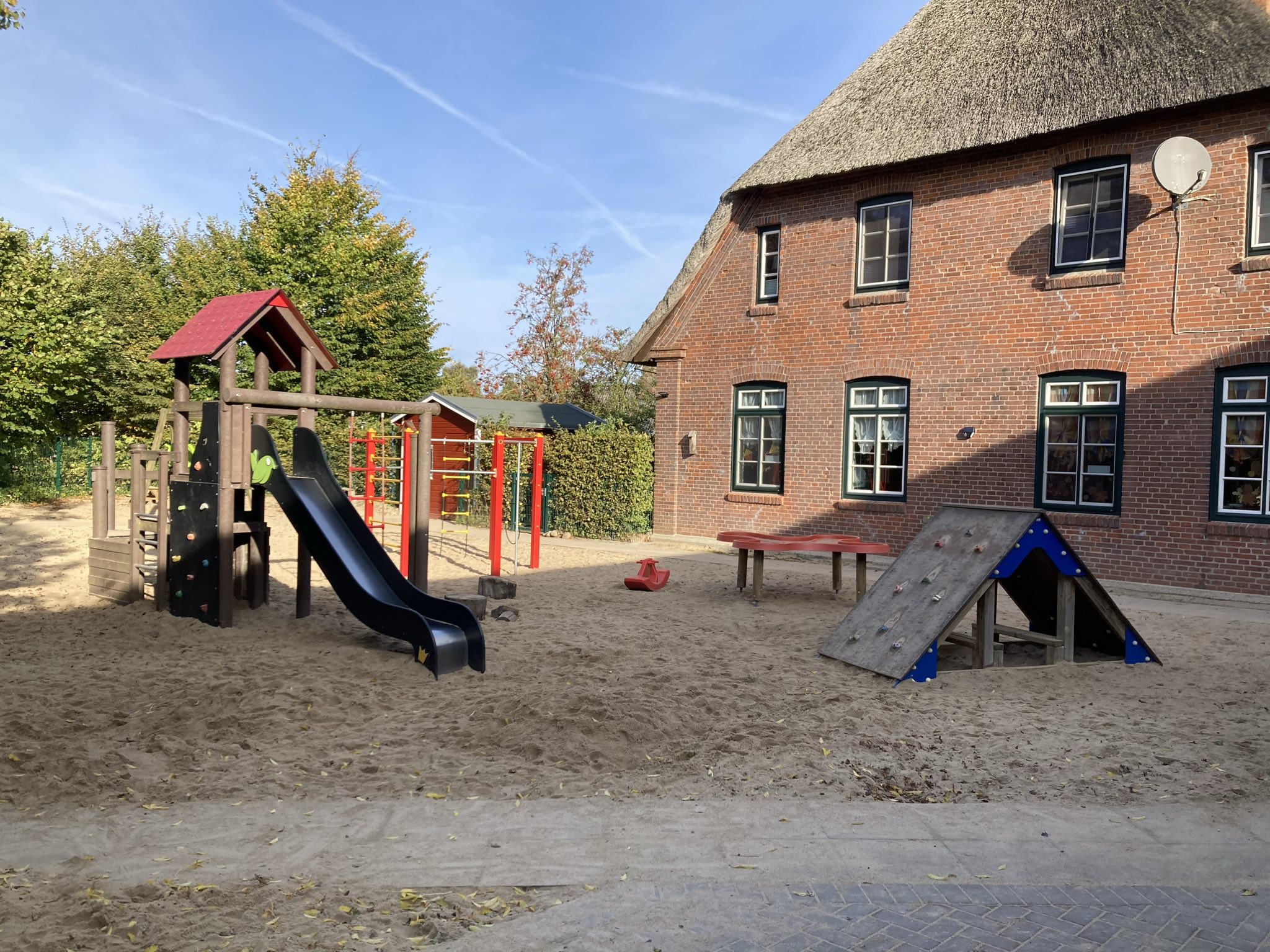 Ein grün blaues Wappen mit Schriftzug SG Hohenfelde