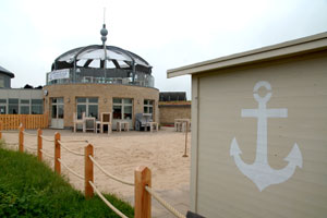 Ein grün blaues Wappen mit Schriftzug SG Hohenfelde